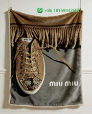 Miumiu Throw Blankets